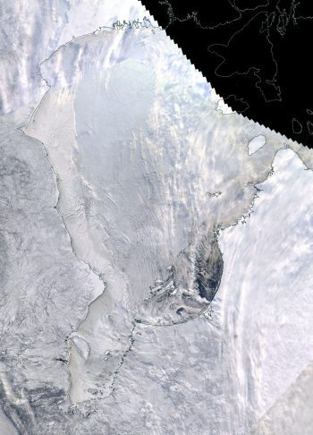 Figure 4. This NASA Worldview image shows the last of the Hudson Bay freezing up along the southeast coast as of December 23, 2021. After a late freeze up, Hudson Bay is completely ice covered as of early January 2022. ||Credit: NASA| High-resolution image 