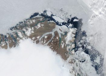 Figure 7. Sea ice as seen from an aircraft over Utqiagvik, Alaska. The ice appeared to be highly decayed with deep melt ponds, many melted completely through the ice. ||Credit: Kevin Woods, NOAA Pacific Marine Environmental Lab | High-resolution image | High-resolution image 