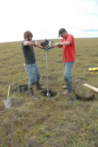 Alessio Gusmeroli and Tim Schaefer drill a permafrost core on the North Slope of Alaska near Deadhorse. Credit: Kevin Schaefer, NSIDC