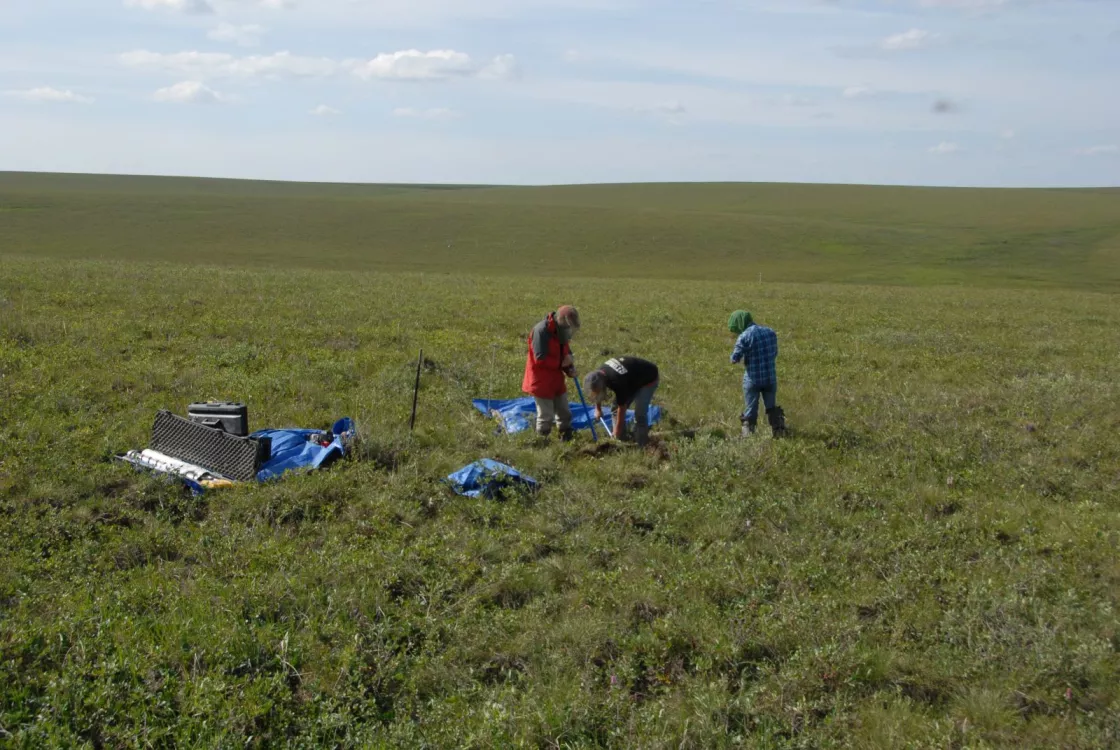 Researchers drill a permafrost core in Alaska