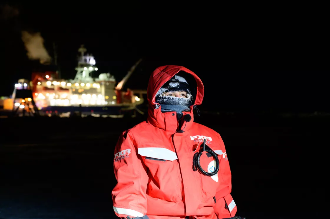 NSIDC researcher Julienne Stroeve stands in front of Polarstern during the MOSAIC expedition