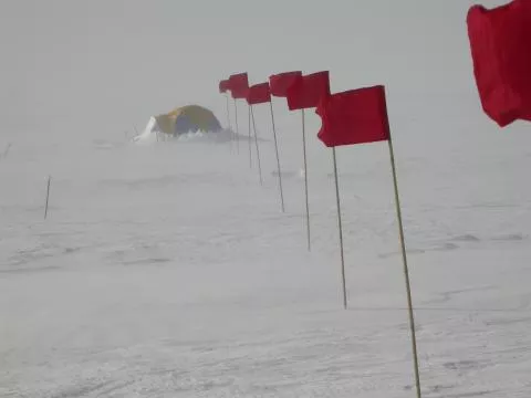 Blowing snow conditions at a camp site near Vostok Station in Antarctic summer.