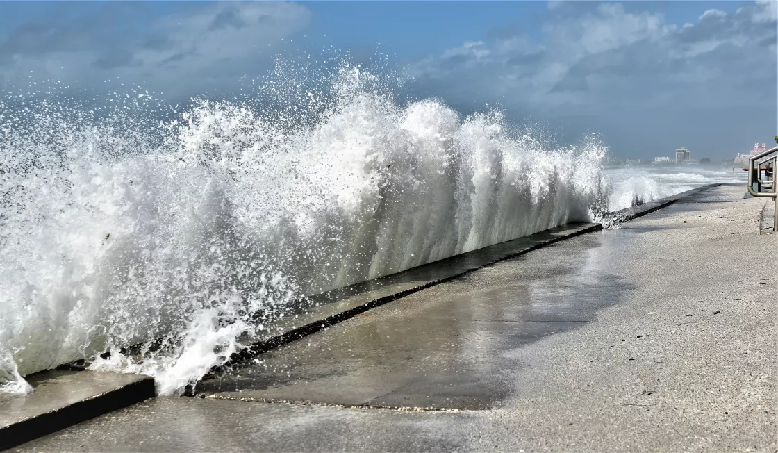 large wave crashes on St. Pete beach in Florida