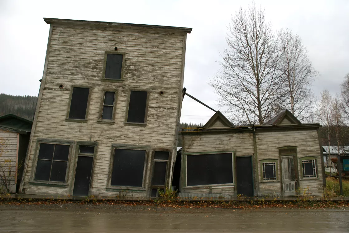 photo of tilted homes in Dawson City, Canada