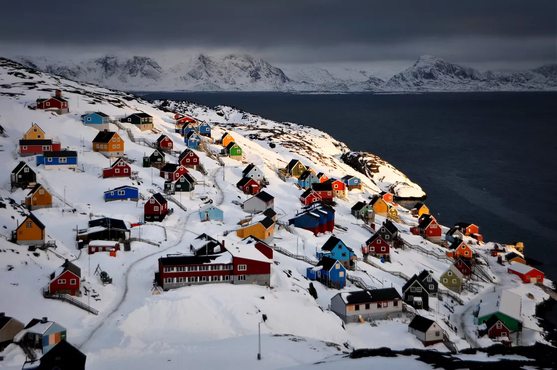 Colorful homes in Kangaamiut, Greenland, in winter
