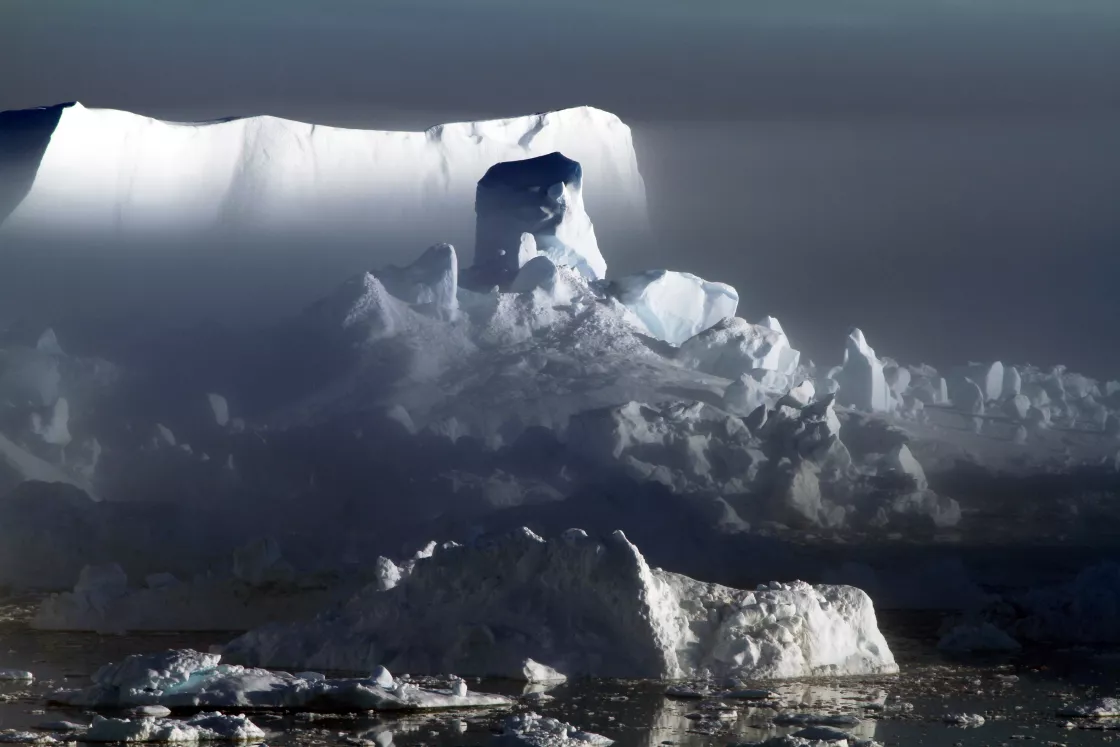 Iceberg claves off of Jakobshan Isbrae, Greenland