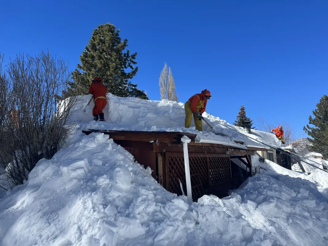 Firefighters assist residents of San Bernardino with snow removal