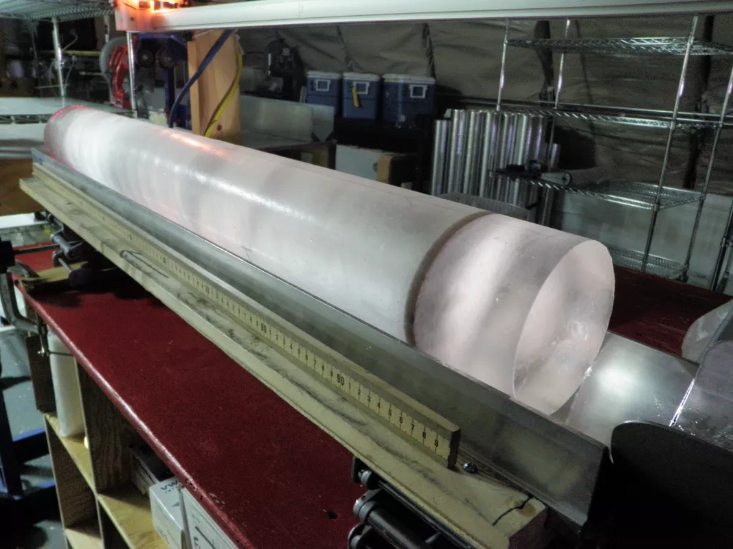 Photo of ice core showing ash layer