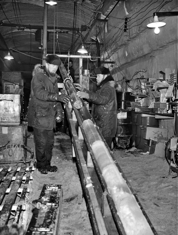 Photograph from 1960s of engineers pulling out an ice core