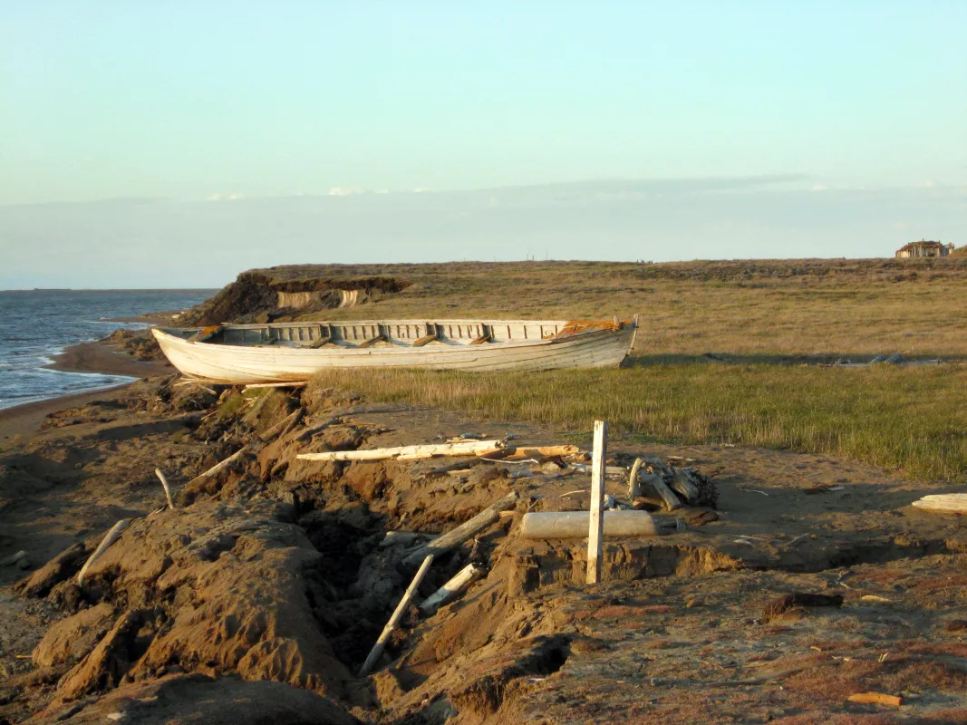Century-old whaling boat rests on an eroded coastline