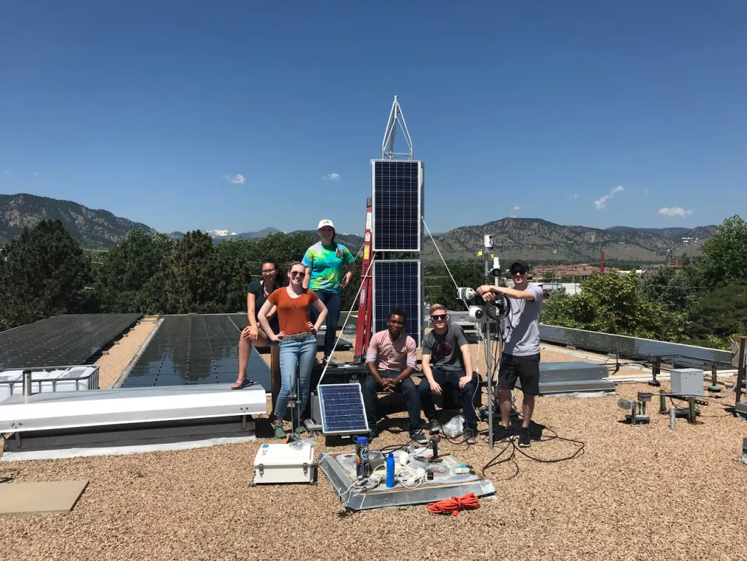 Team JANE assembled the AMIGOS towers on the top of the NSIDC building in Boulder, Colorado, so they could test it undisturbed. From left to right: Skylar Edwards, Raymie Fotherby, Emma Tomlinson, Coovi Meha, Ryan Weatherbee, and Jack Soltys.