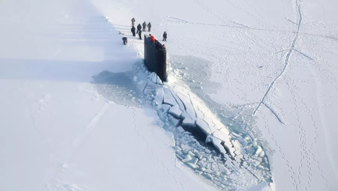 The Los Angeles-class attack submarine USS Hampton breaks thin ice to surface in the Arctic Ocean during the 2014 ICEX campaign. Credit: US Navy courtesy Hamilton Ingalls Industries, Chris Oxley