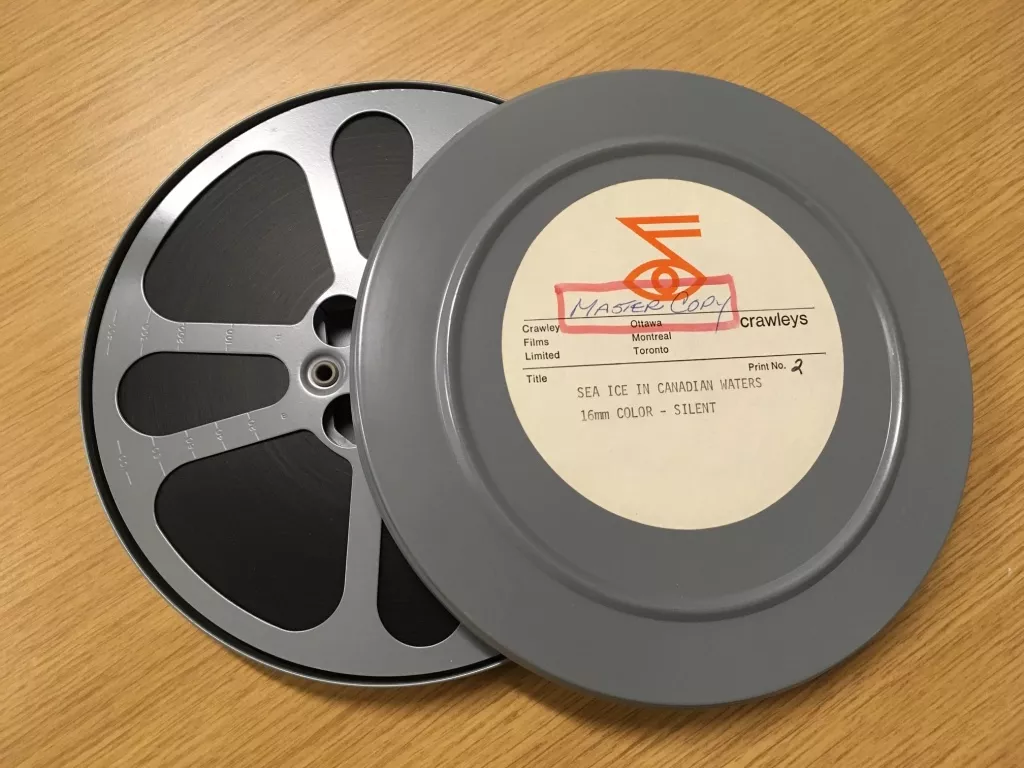 Photograph of analog sea ice data on reel-to-reel tapes