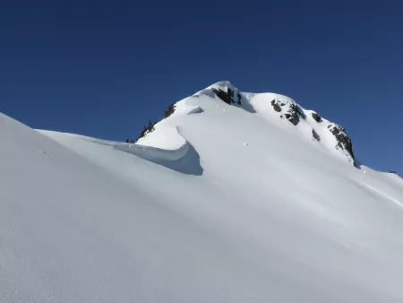 Cornice forms on peak of Ruth Mountain in Washington state