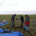 researchers drill a permafrost core