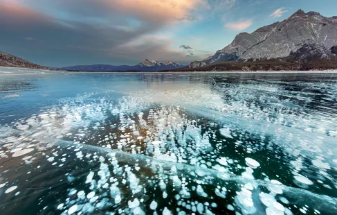 methane bubbles frozen in lake in Canada