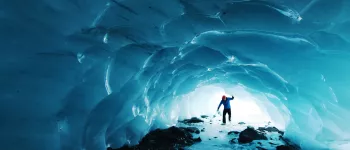 Skating into an ice cave. Byron Glacier, Chugach National Forest, Alaska