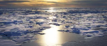 sun over sea ice in Chukchi Sea