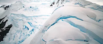 Aerial shot from helicopter over mountains near Paradise Bay, Antarctica